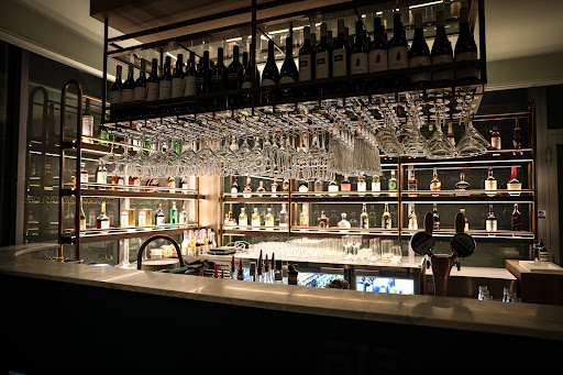 Mani Restaurant logo